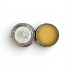 50 mg CBD Lip Balm in a metal tin with lid beside the balm.