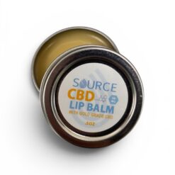 Open 50 mg CBD Lip Balm tin showing the balm and matching metal lid.